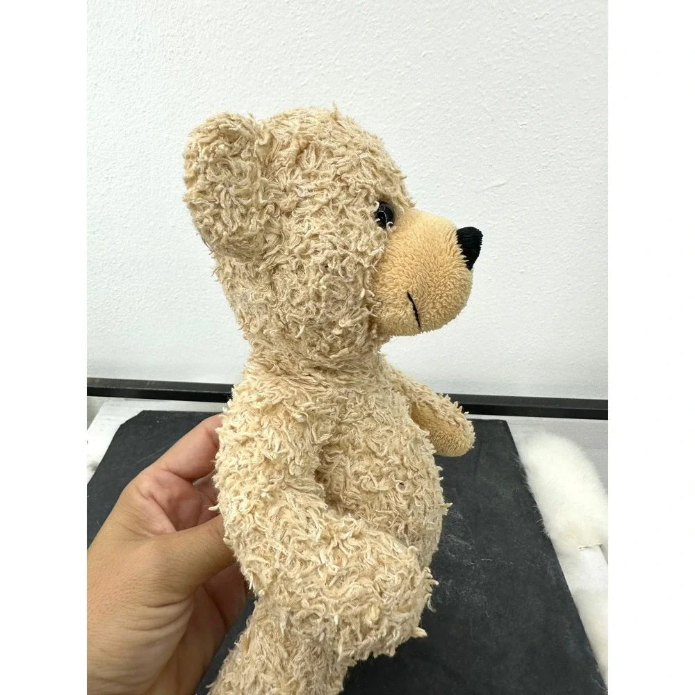 Small Steiff Fynn blonde stuffed teddy bear textured plush